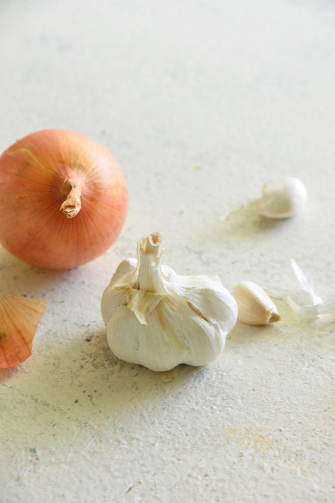 low carb food list image of garlic and onions