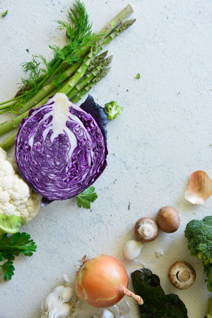 low carb vegetables keto diet an array of low carb vegetables on a white surface